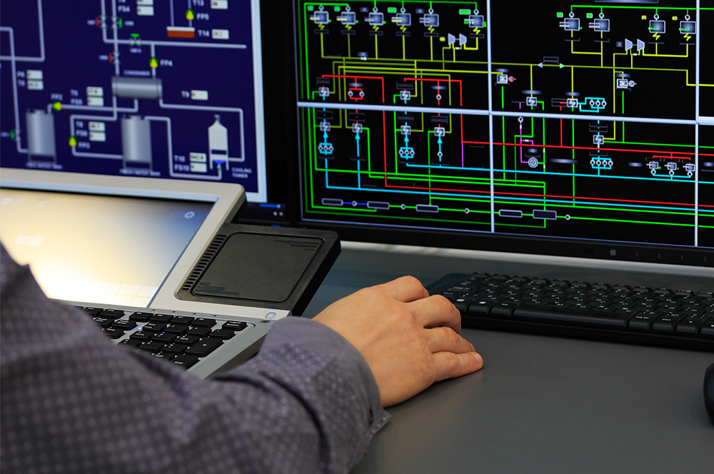 Close up of person working on a SCADA screen